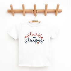 Looking for a cute tee for your kids? We have the perfect Patriotic Stars And Stripes Cursive graphic tee addition to their closet! Also available in youth tees. Patriotic Stars, Target Clothes, Kids Clothes Boys, Sewing Party, Toddler Boy Outfits, Top Graphic Tees, Stars And Stripes, Toddler Tees, Knitted Tshirt