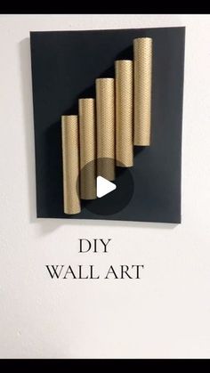 a black and gold wall art with the words diy wall art written below it