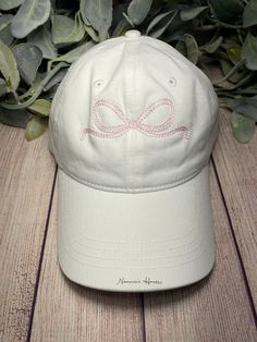 Perfect for the pool, beach, ball field, a rainy day, or EVERY day! Our beautiful hats are a perfect addition to any wardrobe. Unisex sizing. White Cotton Baseball Cap For Beach, White Cotton Beach Baseball Cap, Trendy White Hat With Curved Bill, Trendy White Curved Bill Hat, Trendy Embroidered Beach Hat, Summer Baseball Cap With Embroidered Logo And Short Brim, Cute Baseball Cap With Embroidered Logo, Curved Brim Hat With Embroidered Logo For Gift, Cute Hats With Embroidered Logo And Curved Brim