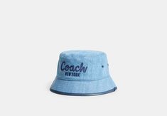 Coach 1941 Embroidered Denim Bucket Hat | COACH Casual Bucket Hat With Embroidered Logo And Short Brim, Vintage Cotton Bucket Hat With Flat Brim, Casual Bucket Hat With Embroidered Logo, Casual Summer Bucket Hat With Flat Bill, Casual Bucket Hat With Embroidered Logo And Flat Brim, Trendy Bucket Hat With Embroidered Logo, Casual Spring Bucket Hat With Embroidered Logo, Denim Bucket Hat, Coach 1941