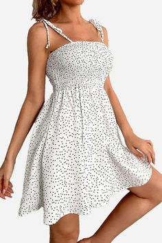 Take your style up a notch this summer with this cute bohemian skater polka dot dress. No better way to enjoy the warm summer breeze than with this breathable mini dress that allows you to move around freely. Its sling knot hand details add elegance and vibrance to this dress. Your next vacation box isn’t fully packed without this dress. Perfect for Summer Flatters your feminine figure Comfy fit Stylish and elegant design Great vacation outfit Perfect gift for a loved one Product Presentation Su Polka Dot Mini Sundress For Summer, Polka Dot Sleeveless Mini Dress For Beach, Sleeveless Polka Dot Mini Dress For Beach, Sleeveless Polka Dot Mini Dress For Vacation, Polka Dot Summer Sundress For Beach, Casual Polka Dot Sundress For Summer, Trendy Knee-length Beach Sundress, Trendy Knee-length Sundress For The Beach, Spring Polka Dot Beach Dress