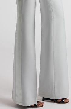 Featured on the label's fall '24 runway show, these wide-leg pants detailed with angled front pockets and tuxedo-style outseam stripes are crafted in a luminous blend wool and silk. 38" inseam; 22" leg opening; 12" front rise; 14" back rise (size 36it) Zip fly with hook-and-bar closure Front slant pockets; back button-welt pockets Cupro/silk lining 90% wool, 10% silk with 100% silk contrast Dry clean Made in Italy Designer Clothing Luxury Wide Leg Dress Pants, Luxury Wide Leg Pants With Pressed Crease, Luxury Tailored Wide Leg Pants, Luxury Wide-leg Evening Bottoms, Luxury Wide Leg Pants With Pressed Crease For Evening, Luxury Wide-leg Pants For Evening, Luxury Wide Leg Pants, Fitted Luxury Wide Leg Pants, Luxury Wide Leg Pants For Spring Formal