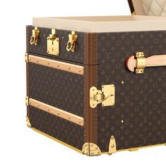 LOUIS VUITTON® - Courrier Lozine Carré Gauche - Monogram Lv Trunk, Louis Vuitton Trunk, Leather Trunk, Travel Trunk, Louis Vuitton Official, Diamond Shaped, Hard Case, Leather Trim, Monogram Canvas