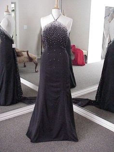 We have this pretty black gown in stock in a size 10.  It can be shipped today! Dress With Beads, Halter Evening Dress, Classy Prom Dresses, Black Prom Dress, Pageant Gowns, Black Prom, Black Halter, Black Gown, Black Prom Dresses