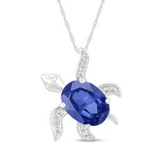 Casual and cute, this blue lab-created sapphire and diamond accent tilted sea turtle pendant captures your lively personality. Crafted in sterling silver This tilted sea turtle design features an 8.0 x 6.0mm oval-shaped bright blue lab-created sapphire as the body. Dainty diamond accents and beaded details adorn the feet for added shimmer and texture. The pendant suspends slightly askew along an 18.0-inch rope chain that secures with a spring-ring clasp. Sea Turtle Design, Italy Jewelry, Diamond Wallpaper, Peoples Jewellers, Turtle Design, Turtle Pendant, Elegant Tattoos, Beach Accessories, Oval Pendant