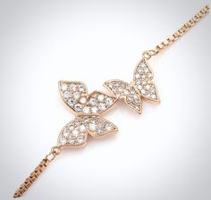 Butterflies represent a passionate bond and endless love. Perfect for a butterfly-themed wedding, this delicate bracelet is an ideal accessory for the minimalist bride, or can make a thoughtful gift for your young bridesmaids or flower girls. Adorned with flawlessly faceted cubic zirconia, it captures the light from every angle with a perfectly translucent appeal, sparkling beautifully. All it takes is a simple glance at this beautiful design to see its extremely subtle and classy look that make