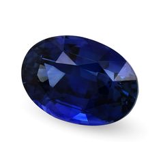 an oval shaped blue sapphire stone on a white background with clippings to the side