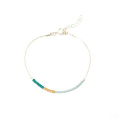 Our handmade Dusk Bracelet, lovingly crafted in our Texas studio, is part of the Desert Sunset collection. This understated modern piece draws inspiration from the breathtaking colors that grace the desert sky at dusk. We meticulously handcraft each piece with utmost care and attention to detail. Using a delicate blend of hand-beaded Japanese glass beads, we carefully selected colors that reflect the serene hues of the desert sunset. The result is a mesmerizing pattern that evokes a sense of tra Handmade 14k Gold Filled Bohemian Bracelet, Handmade 14k Gold-filled Bohemian Bracelet, Handmade Bohemian 14k Gold-filled Bracelet, Handmade Minimalist Bracelets, Minimalist Handmade Bracelets For Everyday, Modern Handmade Bracelets For Everyday, Modern Jewelry With Tiny Beads, Modern Everyday Jewelry With Tiny Beads, Modern Hand-strung Jewelry For Gifts