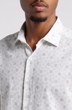 Pale confetti dots cover a garment-washed cotton shirt that will remain cool and breathable when temps spike. 31" length; 48" chest (size XL) Front button closure Spread collar Short sleeves 100% cotton Machine wash, line dry Made in Turkey Cotton Polka Dot Shirt With Button Closure, Polka Dot Cotton Shirt With Button Closure, Polka Dot Cotton Shirt For Spring, Spring Cotton Polka Dot Shirt, Spring Polka Dot Cotton Shirt, Confetti Dots, Fabric Gifts, Anniversary Sale, Free Fabric