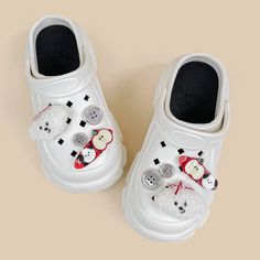 **These shoes are a LIMITED EDITION. Once sold out, they will NOT be restocked!** Features: Get Summer ready with our Sweet Puppy Chunky Slip on Outdoor Clogs! Made with ultra thick and comfy EVA foam to give you the softest steps. Comes with the CUTEST detachable charms, so you can dress up or dress down these clogs to whatever your feet desire. Whether you're out running errands or just hanging out with friends, our shoes will help you look and feel your best. Upgrade your shoe game today! Mad Trendy White Platform Slippers With Round Toe, Trendy White Round Toe Platform Slippers, Trendy Non-slip Clogs With Round Toe, Casual Platform Slippers With Thick Sole And Round Toe, Casual Platform Slippers With Thick Bottom And Round Toe, Casual White Platform Clogs, Trendy Non-slip Round Toe Clogs, Synthetic Clogs With Thick Bottom And Round Toe, Casual Synthetic Clogs For Winter