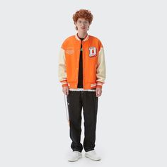 Add retro flair to your wardrobe with our Orange Varsity Jacket. Perfect for everyday wear, its classic baseball style exudes timeless charm. Shop now! Varsity Jacket With Baseball Collar For College Spring Season, Spring Varsity Jacket With Baseball Collar For College, Casual Track Jacket With Contrast Color For Fall, Casual Outerwear With Contrast Color For College, Spring Streetwear Track Jacket With Contrast Color, Casual Contrast Color Outerwear For College, Casual College Outerwear With Contrast Color, Casual Outerwear For College During Baseball Season, Spring College Track Jacket With Baseball Collar