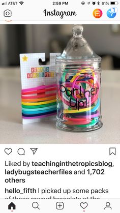 the instagram page on instagram com shows an image of a jar with colorful ribbons in it