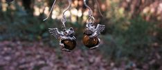 Here are a pair of sterling silver Angel Kitty earrings with 8 mm Tiger eye stones.  These Kittens weigh only 3.0 grams each and measure 3/4 of an inch from ears to tail.  A brand new design from my studio, fully detailed on all sides and clearly marked sterling silver.   The Tiger eye is beautiful African  quarried that has been highly polished with lots of bright yellows and browns. Sterling Silver French ear wires and a gift box included.  Thank you. Cute Nickel-free Pendant Jewelry, Sterling Silver Hypoallergenic Pendant Earrings, Cute Sterling Silver Earrings With Ear Wire, Cute Round Charms Jewelry, Nickel-free Cute Sterling Silver Jewelry, Cute Nickel-free Sterling Silver Jewelry, Cute Sterling Silver Nickel-free Jewelry, Cute Sterling Silver Dangle Earrings, Cute Adjustable Pierced Jewelry