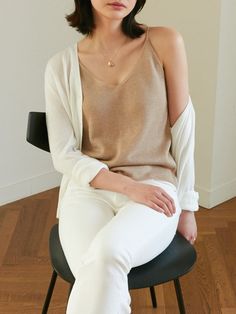 Sleeveless linen knit tank, perfectly worn in shirt with high quality stitching. Feels soft to the touch and is perfect for summer. Model is wearing MINUSEY ONE SIZE. Please allow 5-12 days shipping when in restocking.* MINUSEY ONE SIZE = EU 34-38, US 2-6* 60% Linen / 20% Rayon / 20% Acrylic* Dry clean* Made in Korea - Model Height: 171cm/5'7" (US 2, EU 34) Chic Spring Sweater Vest For Everyday, Versatile Tank Top For Summer Loungewear, Soft Knit Sweater Vest For Spring Layering, Casual Everyday Linen Vest, Casual Everyday Seamless Camisole, Casual Seamless Camisole For Everyday, Casual Spaghetti Strap Tank Top, Chic Spring Sweater Vest In Soft Knit, Chic Spring Soft Knit Sweater Vest