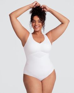 Honeylove's LiftWear Tank Bodysuit is powerful and versatile. This Bodysuit features 360° bonded compression to sculpt your midsection, underwire-free bust support so you can ditch your bra, and wide straps that won't dig in. This garment features an adjustable gusset that anchors the garment to ensure it always stays tucked in. Wear as an undergarment or a stylish top. Honeylove, Tank Bodysuit for Women in Astral (White), Size: 2X Supportive Full Coverage Swimwear Shapewear, White Underwire Bodysuit With Built-in Bra, White Shapewear With Medium Bust Support, White Seamless Shaping Shapewear, Supportive Full Coverage Shapewear With Built-in Padding, White Fitted Bodysuit With Built-in Bra, White Full Coverage Stretch Shapewear, White Seamless Shapewear Bodysuit, White Stretch Bodysuit With Built-in Bra