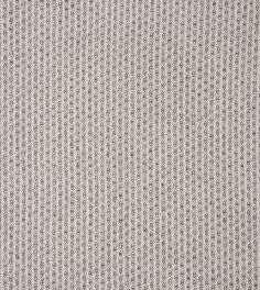 an upholstered fabric with small circles on it