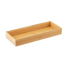 an empty wooden tray on a white background