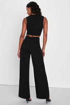 With a chic blazer, leather jacket, or coat, there's no end to how you could style the Lulus Enticing Endeavors Black Two-Piece Jumpsuit! This sleeveless jumpsuit is made from stretchy crepe knit with a square neckline and a princess-seamed seamed bodice. The matching bottoms feature a high, banded waist that tops classic, wide pant legs that fall to ankle-length hems. Hidden back zipper. Fit: This garment fits true to size. Length: Floor length. Size medium Inseam: 32.50 Front Rise: 14.50 Bust: Chic Blazer, Two Piece Jumpsuit, Black Two Piece, Lulu Fashion, Wide Pants, Sleeveless Jumpsuits, Princess Seam, Strapless Bra, Small Tops