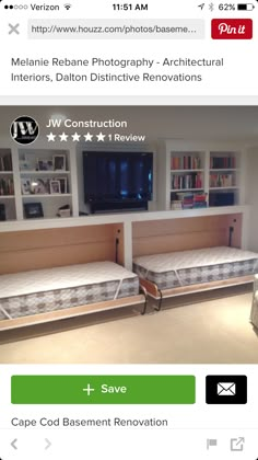 there are two beds in this room with built - in bookshelves on the wall