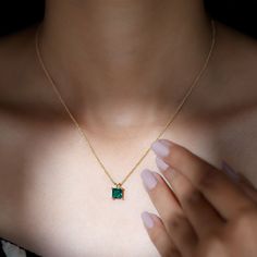 Product Details Emerald is known for its Elegance. The Solitaire Pendant is embellished with 6 MM Princess Cut Lab Created Emerald with a 14K Solid Gold Bail in 4 Prong Setting is a must have Party Wear Jewelry. Product Information SKU SHP-PENDANT082019417 Length 9 mm Width 6.8 mm Weight 3.12 gm (Approximate) LAB CREATED EMERALD INFORMATION No.of Stones 1 Pieces Total Weight 1.20 Carat (Approximate) Dimension(approx) Princess Cut-6X6 mm-1 Pcs Color Green Cut Brilliant Shape Princess Cut Setting Formal Emerald Necklaces With Diamond Cut, Dazzling Gold Emerald Necklace, Elegant Emerald Necklace With Prong Setting For Formal Occasions, Elegant Formal Emerald Necklace With Prong Setting, Gold Plated Emerald Necklace For Formal Events, Formal Gold Plated Emerald Necklace, Formal Gold-plated Emerald Necklace, Elegant Gold Emerald Necklace With Brilliant Cut, Luxury Gold Solitaire Necklace For Wedding