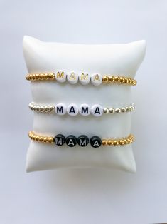 "A beautiful beaded bracelet with the word \"mama\" on it. Perfect for the mom, perfect as a gift and it especially makes a great Mother's Day gift. These are SUPER popular! Please choose your color of beads and if you would like it personalized with something other than \"MAMA.\" Thanks for looking and we hope you find something you adore." Birthday Bracelets With Name On Round Beads, White Adjustable Bracelets For Mother's Day, Mother's Day White Bracelets With Letter Beads, Adjustable White Bracelets For Mother's Day, Meaningful Name Bracelet For Mother's Day Gift, Adjustable Beaded Meaningful Bracelets, Adjustable Name Bracelet As Gift For Mom, Birthday Beaded Name Bracelets With Round Beads, Personalized Bracelets As Gift For Mom