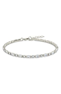 Perfect to stack or wear solo, this elegant tennis bracelet offers glamorous sparkle with mixed-cut cubic zirconia. 7" length; 1" extender Lobster clasp closure 14k-gold plate or silvertone plate/cubic zirconia Imported Silver Tennis Bracelet, Bracelet In Silver, Tennis Bracelet, Lobster Clasp, Nordstrom Rack, Cubic Zirconia, Georgia, Silver Tone, Silver Jewelry