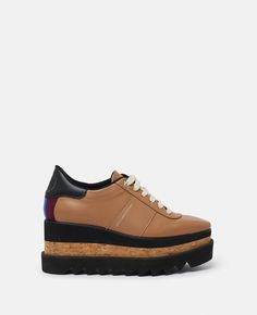 Discover Stella's Brandy Sneak-Elyse Platform Trainers today. Free standard shipping is available on all orders. Shop online now. Stella Mccartney Sneakers, Stella Mccartney Logo, Platform Loafers, Vegan Bags, Brown Sneakers, Sneaker Wedge, Platform Sneakers, Espadrilles Wedges, Long Wallet