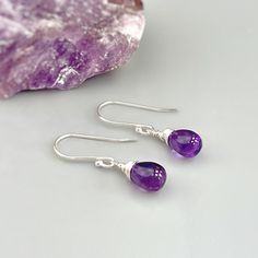 Handmade Amethyst sterling silver boho earrings for women. Purple Amethyst gemstones hang from hand crafted sterling silver, Rose Gold Fill or 14k Gold Fill ear wires or leverbacks. Dainty lightweight earrings perfect for everyday wear.  Handmade Jewelry crafted with love one at a time in my northern Michigan studio. Gemstones are nature's creations and may vary slightly in color and inclusions, but all are lovely and hand selected to match. These earrings are Dainty approx 3/4" (18mm) long including the ear wires / leverbacks. The gemstones are approx. 1/4" wide Amethyst is February's birthstone. We have more Handmade Amethyst jewelry, hair accessories, and hair jewelry available in our store: https://www.etsy.com/shop/BlueHeronJewelry?ref=seller-platform-mcnav&search_query=Amethyst I lov Teardrop Birthstone Jewelry, Teardrop Gemstone Earrings As Gift For Her, Sterling Silver Teardrop Earrings For Her, Sterling Silver Teardrop Earrings As A Gift For Her, Sterling Silver Dangle Jewelry With Birthstone, Everyday Sterling Silver Drop Jewelry, Minimalist Purple Jewelry For Everyday, Teardrop Gemstones In Fine Jewelry Style, Sterling Silver Birthstone Dangle Jewelry