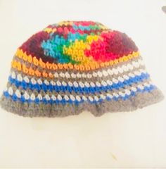 Chakra colors and NY colored beanie for our hippy tribe.  This is a new atyle that fits right above the top of your ear and brow, it fits like a mushroom hat and has a cool strioes pattern and sprial pattern at the top/center of the crochet hat.  This is uniswx and can git children and adults.  Donations can go to your favorite organization.  Please detail in the messages. Happy New Year and thank you for the continued support #teamjennmoves and #teamjennsjewelz. Casual Beanie For Festivals, Multicolor Beanie One Size For Beach, Casual Multicolor Beanie One Size, Multicolor Beanie For Beach, One Size Fits Most, Multicolor Beanie For Beach, One Size, One Size Bohemian Beanie, Casual Crochet Hat For Festival, Casual Multicolor Beanie For The Beach, Casual Multicolor Beanie For Beach