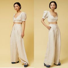 The Suboo Cecile Linen High Waisted Wide Leg Pant Is Our Must-Have Pants Of The Season. Super High Waisted And Flattering, This Pants Feature A Unique Detailing With Tortoiseshell Buttons And Stitching At The Front. We Recommend Pairing These Pants With A Crop Top To Complete Your Look. Retail $200 Fabric Composition: 55% Linen 45% Cotton Measurements: 12” Across Waist, 14” High Rise, 30” Inseam, 25” Leg Opening. Fitted Cropped Beige Pants, Beige Fitted Cropped Pants, Beige Cropped Bottoms For Summer, High Waisted Wide Leg Pants, High Waist, High Waisted Pants, Wide Leg Pants, Pant Jumpsuit, Wide Leg