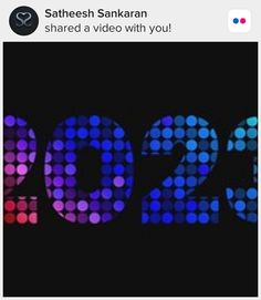 an image of the numbers 2012 in blue and pink dots on a black background with text that reads, sathesh sankan shared video with you