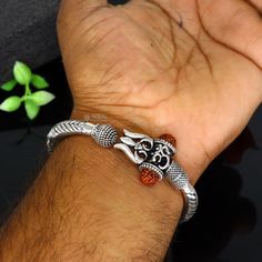 Amazing handcrafted chitai or kandrai work 925 sterling silver vintage design custom-made oxidized silver personalized unisex gifting jewelry from india. Metal-925 sterling silver. Item type-/bracelet/ Kada. Weight-48.850 grams. Size-2-6 (2.375 inches inner diameter)We can easily adjust by twisting it for bigger size. Width-1.0 centimetres Stamped- 925. Finish-Oxidized. Makes excellent gifting for birthday, mother's day, father's day, Christmas day,valentinesday, wedding, anniversary gifts Symbolic Handmade Jewelry For Festivals, Symbolic Festive Jewelry For Festivals, Symbolic Silver Jewelry For Festivals, Symbolic Jewelry For Navratri Puja, Adjustable Spiritual Jewelry For Diwali, Symbolic Jewelry For Diwali Puja, Symbolic Jewelry For Puja And Diwali, Symbolic Intricate Design Jewelry For Festivals, Symbolic Jewelry For Puja During Diwali