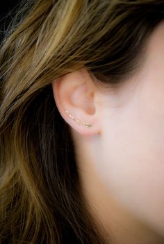 These little Ear Climbers in 14k Rose Gold-Fill are incredibly sleek and stylish, with a fit so comfortable you'll forget you're even wearing them! You can now choose from either SMOOTH for a slightly faceted, reflective finish or HAMMERED for a sparkling, textured finish. Each earring will come with a classic ear nut backing. Choose ONE SINGLE CLIMBER (specify which ear) or a PAIR. Each Climber measures approximately 1 inch. Also available in 14K Gold Fill or Sterling Silver metal. This item is Everyday Minimalist Rose Gold Ear Climbers, Minimalist Rose Gold Ear Climbers For Everyday, Minimalist 14k Rose Gold Ear Climbers, Hypoallergenic 14k Gold Ear Climbers, Dainty Gold-plated Ear Climbers As Gift, Rose Gold Earring, Earring Minimalist, Ear Climber, Stacking Ring Set