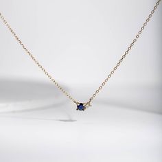 Blue Sapphire Diamond necklace in 14K solid yellow gold in cluster set. A minimal necklace for women with natural gemstones. A great gift for her. D E T A I L S● Metal: 14K solid gold, 14K white gold or 14K rose gold● Gemstones: Sapphire, round cut 3mm, Diamond, brilliant cut, 2mm● Gemstones Weight: Sapphire 0.10 ct, Diamond 0.03 ct● Length: 40 cm - 16 inchesH O W ∙ T O ∙ O R D E RChoose from the drop-down menu the available options (Metal) and leave us a note for any special requirements.G I F Elegant 14k Gold Birthstone Necklace For Birthday, Elegant Yellow Gold Birthstone Necklace For Birthday, Minimalist Sapphire Necklace For Gifting, Elegant Sapphire Jewelry For Birthday, Natural Birthday, Sapphire Diamond Necklace, Gold Amethyst Ring, Blue Sapphire Necklace, Natural Gemstone Necklace