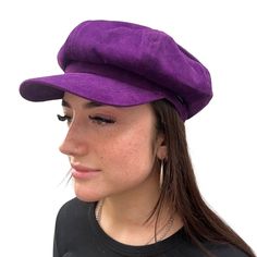 Our new CRAGGI Baker Boy Hat is made from a fabulous Purple Velvet fabric with a matching lining inside to prevent any scratching.The elasticated fitting will help you brave the wind and makes it one size fits all. This hat is a perfect fashion accessory for a day around town,holidays,Festivals and nights out with friends. Whether you're on Campus ,outdoors walking or running errands it's the perfect cap to match with your outfits. This cap is size 56-60cm with an elasticated back for a perfect Spring Visor Beret With Adjustable Fit, Trendy Adjustable Brimmed Beret, Trendy One-size Beret Cap, Trendy One Size Fits Most Beret Cap, Trendy One-size-fits-most Beret Cap, Trendy One Size Fits Most Beret, Adjustable Beret With Short Brim, Trendy One-size Flat Cap, Trendy One Size Flat Cap