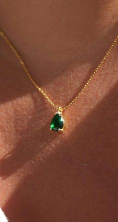 Elevate your elegance with our Emerald Pendant Necklace, featuring a genuine green emerald, perfect for those born in May. This exquisite necklace showcases a tiny teardrop-shaped emerald pendant, set delicately on a dainty chain. Chain Length: 16+2". Key Features: Genuine Green Emerald: Authentic, vibrant green emeralds for a stunning appearance. Teardrop Pendant: A petite pear-shaped emerald adds a touch of grace. May Birthstone: Celebrate your birth month or give a meaningful gift. Dainty Design: Perfect for everyday wear or special occasions. Material: High-quality, 925 Solid Sterling Silver over 14k gold plated or silver.  that ensure long-lasting wear. Emerald Jewelry Aesthetic, Gold And Green Jewelry, Emerald Gold Necklace, Emerald Jewelry Necklace, Self Portrait Collage, Emerald Pendant Set, Emerald Necklace Gold, Gold Emerald Necklace, Sza Concert