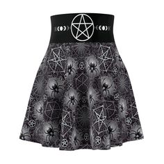 Embrace your dark side with this stunning Gothic skater skirt, featuring an intricate pentagram design on the waistband, surrounded by moon phases. The flowing skirt is adorned with detailed spider web patterns and mysterious spiders, creating a perfect blend of witchy and alternative fashion. This skirt is ideal for those who love Gothic style, Wiccan aesthetics, or are looking for a standout piece for Halloween or everyday dark fashion. Pair it with your favorite tops and accessories to complete your look. .: 95% Polyester 5% Spandex .: Versatile fit .: Assembled in the USA from globally sourced parts Gothic Pleated Skirt For Summer, Fitted Gothic Pleated Skirt, Gothic Summer Festival Skirt, Spider Web Skirt, Embrace Your Dark Side, Gothic Pleated Mini Skirt, Pentagram Design, Web Patterns, Flowing Skirt