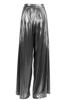 Palazzo pants are the perfect fashion statement for a night out! Steal the spotlight in these beautiful high waisted wide leg palazzo pants. They are made of a luxurious metallic fabric, a hidden zipper on the side, and feature a wide leg silhouette. These high waisted wide leg trousers are perfect for any occasion. Wear them to work, to a party, or to the grocery store, these pants will never let you down. The metallic finish is flattering on any skin tone and will never go out of style. team t Silver Elegant Evening Bottoms, Glamorous High Waisted Wide Leg Pants For Party, Glamorous High Waist Wide Leg Pants For Party, Shimmer Bottoms For Evening Party Season, Shimmer Bottoms For Evening And Party Season, Chic Metallic Shiny Pants, Elegant Shiny Bottoms For Evening, Elegant Shiny Bottoms For Night Out, Elegant Shimmer Bottoms For Evening