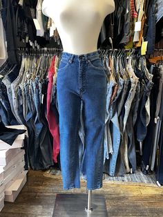 ♥ D E S C R I P T I O N ♥ Vintage 90s Daily Jeans slim/skinny tapered leg high rise dark wash denim stretch mom jeans.  ♥ S I Z E & M E A S U R E M E N T S ♥ Measurements taken across while garment laying flat and unstretched. Double measurement to get the all around. Waist: 11.5 in  Hips: 17 in Length: 38 in Inseam 28.5 in  Rise: 11 in Fits size small Labeled size 7/8 ♥ Authenticity Guarantee ♥ All items sold in our shop are 100% guaranteed authentic vintage or your money back. High Waist Stretch Cropped Jeans For Everyday, Stretch High Waist Cropped Jeans For Everyday, Stretch High-waist Cropped Jeans For Everyday, Trendy Fitted Rigid Denim Bottoms, Dark Wash Non-stretch Tapered Jeans, 90s Style Denim Blue Jeans For Fall, Trendy Dark Wash Cropped Jeans With Tapered Leg, Trendy Dark Wash Tapered Leg Cropped Jeans, 90s Style Dark Wash Bottoms For Fall