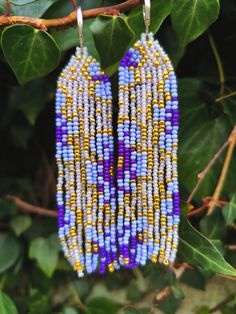 Floral Design Beaded Fringe Earrings Made of Miyuki Beads in Blue and Purple colours (сolors may vary due to your screen settings) Length- 9 centimeters Width - 2.5 centimeters Earrings are perfect as a gift. Ear clasp- you can choose between options brass ear wire in silver color or 925 sterling silver clip on. Occasion - any occasion to enjoy your life and decorate every day with bright details. Purple Beaded Earrings With Round Beads For Festival, Festival Purple Beaded Earrings With Round Beads, Blue Beaded Earrings With Gold Beads For Festivals, Sunflower Family, Beaded Fringe Earrings, Blue Floral Design, Enjoy Your Life, Miyuki Beads, Beaded Fringe