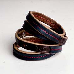 The Leather Wrap bracelets have been a top seller from the beginning. Choose from our everyday leather handbag leathers stitched to the top of our latigo wrap bracelets. Wear alone or layer them for the perfect arm party---these pieces are sure to be a favorite! Layer them all! -Bracelet wraps twice around wrist -3 adjustable sizes Handmade Leather Wrap Bracelet Gift, Handmade Leather Wrap Bracelet For Gift, Minimalist Leather Bracelets With Leather Strap, Leather Bracelet With Black Band For Everyday, Leather Bracelets For Everyday Use, Everyday Leather Bracelets With Black Band, Everyday Leather Bracelet Jewelry, Handmade Adjustable Leather Wrap Bracelet, Handmade Leather Bracelets For Everyday