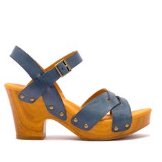 A Wooden Platform, Brings Vintage Vibes To A Cushioned Retro Sandal. Opened Toe, Adjustable Side Buckle Strap Enclosure. 3.5 Inch Heel, 7/8” Platform. Adjustable Blue Open Toe Slingback Sandals, Blue Sandals With Buckle Closure, Blue Buckle Closure Wedge Sandals For Summer, Blue Slingback Sandals With Buckle For Summer, Blue Slingback Sandals With Buckle Closure For Summer, Blue Slingback Sandals With Buckle Closure For Spring, Blue Wedge Sandals With Buckle Closure, Blue Summer Wedge Sandals With Buckle Closure, Blue Clogs With Wooden Heel For Summer