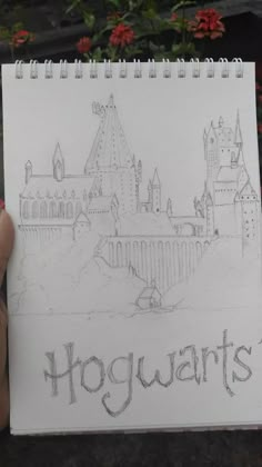 a drawing of hogwart's castle with the words hogwarts written on it