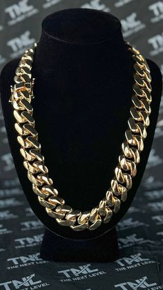 PRODUCT IS BACK IN STOCK AND READY TO SHIP - GRAB YOURS NOW BEFORE THEY'RE GONE AGAIN! 🚀🔥 ⛓ The Chain :Introducing This stunning Cuban chain, crafted with the finest materials to provide you with a timeless accessory that exudes luxury and style. Measuring 22mm in width and 24 inches in length, this chain is the perfect statement piece to complement any outfit. Made with 5x real 18k gold plating, this chain boasts a brilliant shine that is sure to turn heads. The gold plating ensures durability and longevity, meaning you can wear this chain with confidence for years to come. Featuring a classic Cuban link design, this chain offers a bold and sophisticated look that is sure to impress. The links are expertly crafted to provide a smooth and comfortable fit, making it easy to wear all day l Gold Cuban Link Necklace For Streetwear, Gold Cuban Link Necklace With Curb Chain For Streetwear, Gold Chunky Chain Jewelry For Streetwear, Gold Cuban Link Jewelry For Streetwear, Gold Chain Link Jewelry For Streetwear, Gold Link Jewelry For Streetwear, Gold Chain Link Necklace For Streetwear, Gold Chain Necklace For Streetwear, Gold Jewelry For Streetwear