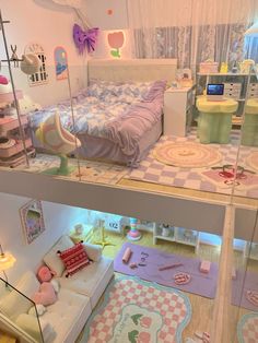 a dollhouse bedroom with pink and white decor on the walls, flooring and furniture