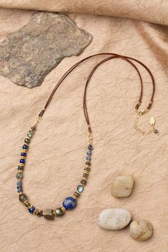 Discover the vibrant and stunning colors of the Blue Moon Collection in this eclectic necklace! Gold Filled (Lead & Nickel Free) Pyrite, Lapis Lazuli, Sodalite, Abalone, Labradorite 27.5-29.5" adjustable length, with gold filled lobster claw clasp We hand select our natural materials, thus there may be slight variations in color and/or size that will not detract from the overall aesthetic. Our unique handcrafted designer jewelry for women is made in America, each design created individually in o Eclectic Necklace, Floyd Va, Cord Necklaces, The Blue Moon, Silver Gold Earrings, Silver Gold Necklace, Eclectic Jewelry, Pyrite Necklace, Moon Collection