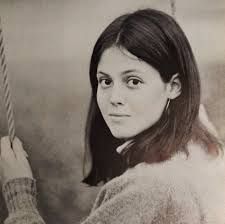 an old photo of a young woman holding a rope with the caption, sojouney alexandria weaver