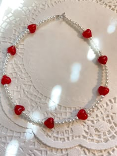 Introducing the Amorette necklace!❤️ This necklace is made with size 5mm acrylic pearls, along with red heart glass beads! Necklace is 16 inches long If you have any questions please feel free to message me! Thank you for supporting my small business!❤️ Necklaces From Beads, Red Heart Beads Necklace, Beads Necklace Ideas, Heart With Beads, Pulseras Ideas, Heart Beaded Necklace, Valentines Day Necklace, Craft Necklace, Anting Manik