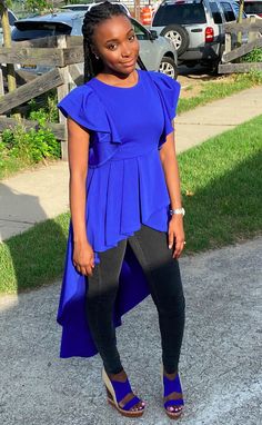 Our Renee Ruffle Hi-Low Top is made using 95% polyester and 5% spandex fabric. It has beautiful ruffle detail along the shoulders and a gorgeous ruffle hi-low peplum. It can be worn with jeans or even a sophisticated pencil skirt. Dress it up or dress it down, either way, this is a statement piece! Color: Royal Blue Content: 95% polyester, 5% spandex Pencil Skirt Dress, Skirt Dress, Spandex Fabric, Low Top, Peplum Top, Royal Blue, Pencil Skirt, Pencil, Spandex