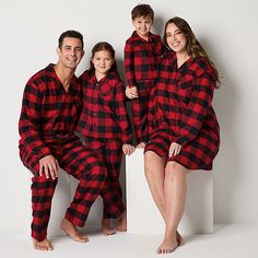 Perfect for lounging at home or a matching family photo moment during the holidays, this North Pole Trading Co. women's tall 2-piece pajama set features a classic red and black buffalo plaid pattern. Made from cotton-flannel, it includes a long-sleeve button-down top with a notch collar and a chest slip pocket paired with matching drawstring pants with side slip pockets.# Pieces In Set: 21st Piece Description: Top1st Piece Collar: Notch Collar1st Piece Pockets: 1 Chest Slip Pocket(s)1st Piece A… Black Pjs, Ideas Candles, Holidays With Toddlers, Perfect Christmas Tree, Parties Food, Family Pjs, Red Buffalo Check, Family Pajama Sets, Christmas Jammies